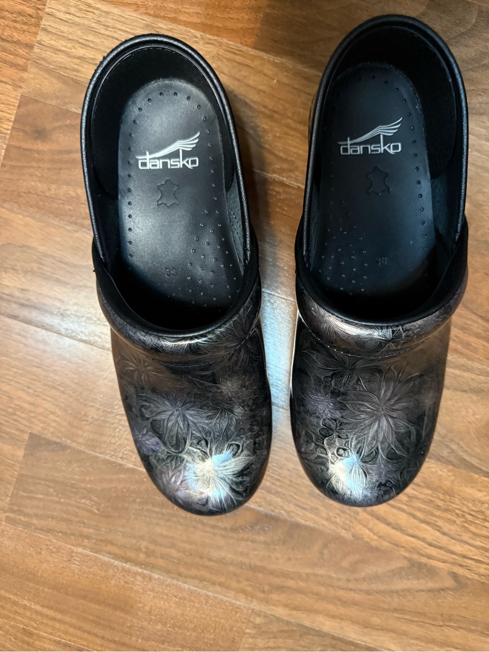 Dansko Black Floral Leather Clogs